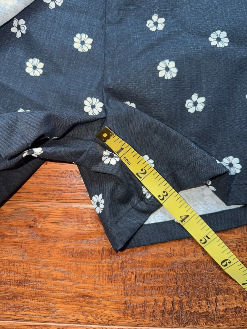 Nicole Miller Black Wrap Skort with White Daisy Print, size 10